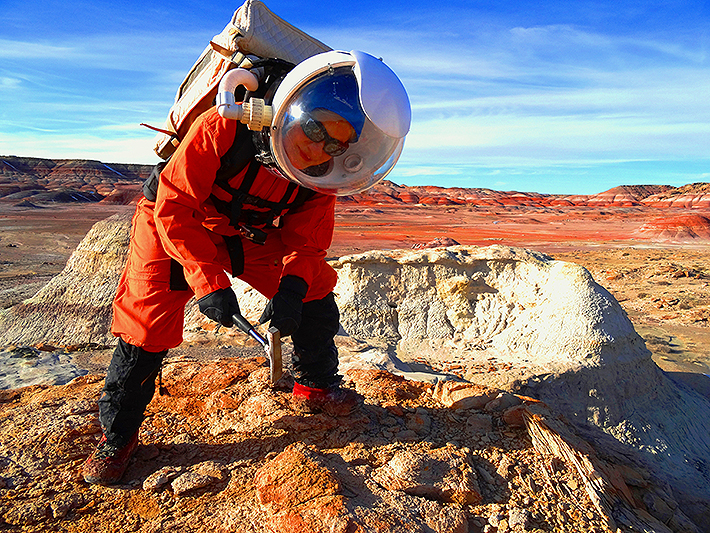 MM doing geology research